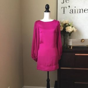 Stand out in Style! Cache Satin Split Bishop Sleeves